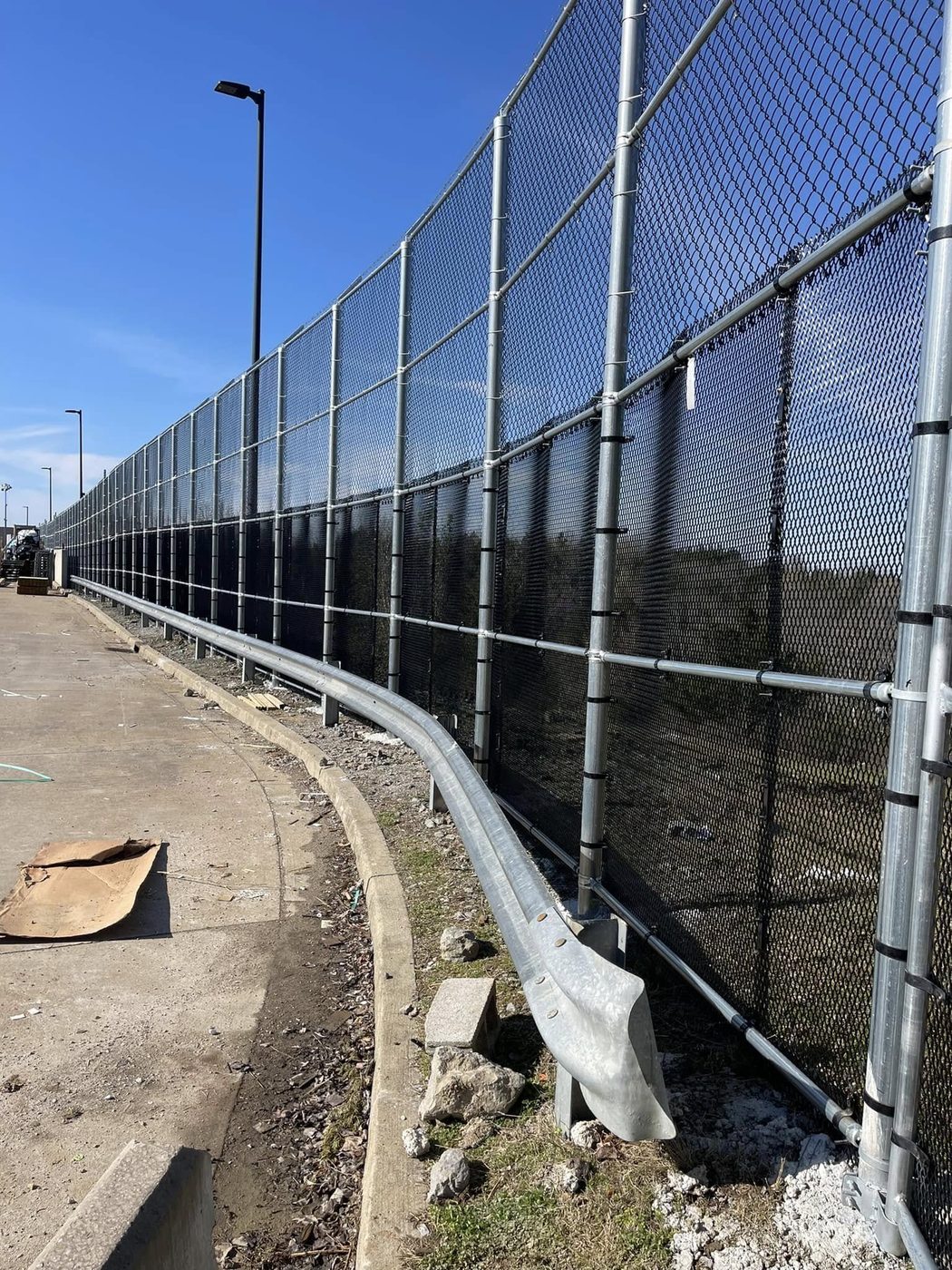 Tall security fencing with privacy slats